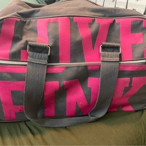 Victoria’s Secret pink duffel bag with wheels